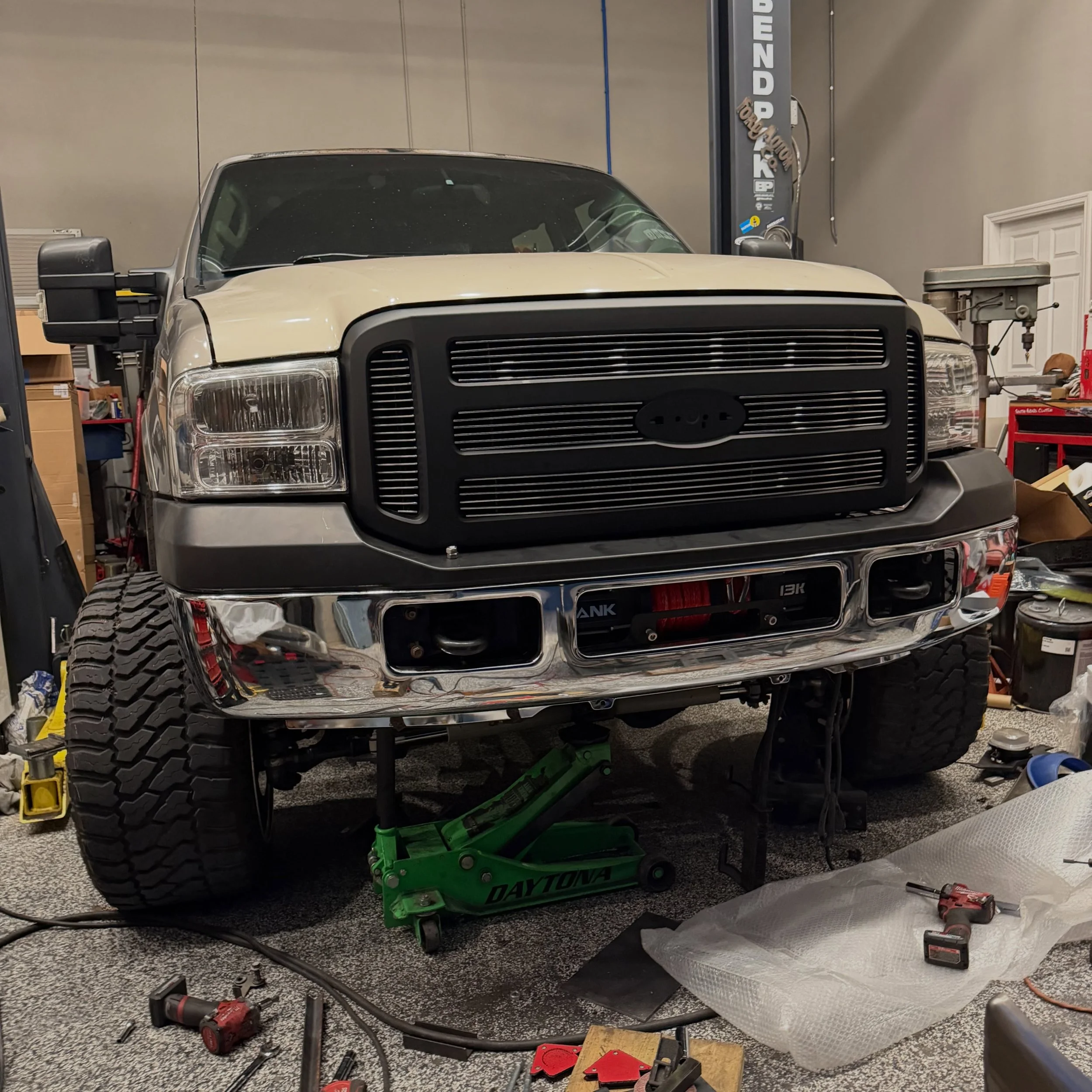 Took a trip to @dr.garfs_shweddy_hvac_service shop to fabricate this hidden winch mount for his 2003 7.3 Excursion💪 

Yes, Shade Tree can do custom fabrication as well!

#diesel #powerstroke #excursion