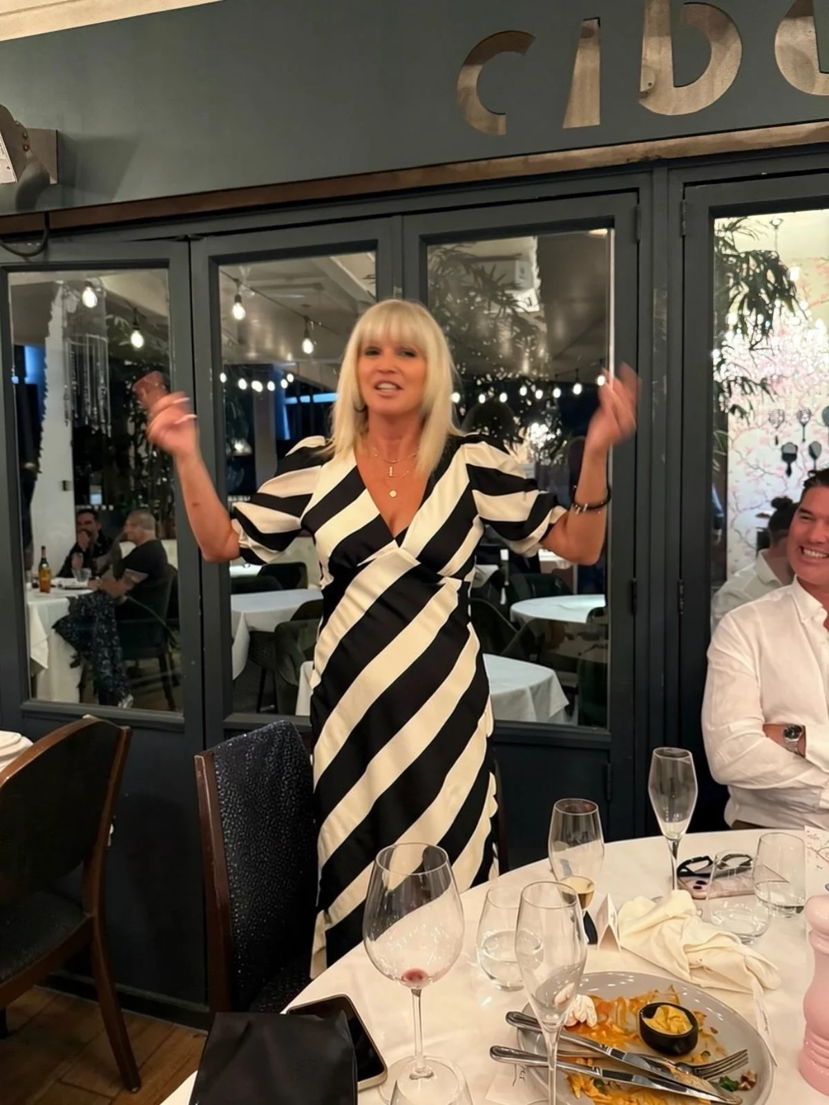 Penelope MCing an event