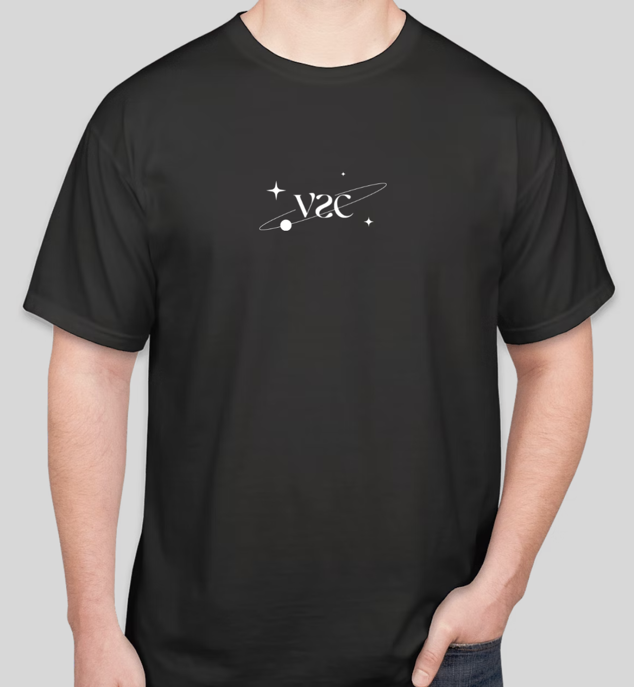 Black T-shirt with a white space-themed design and the word 'NASA' written in reverse, featuring stars and planetary orbits.