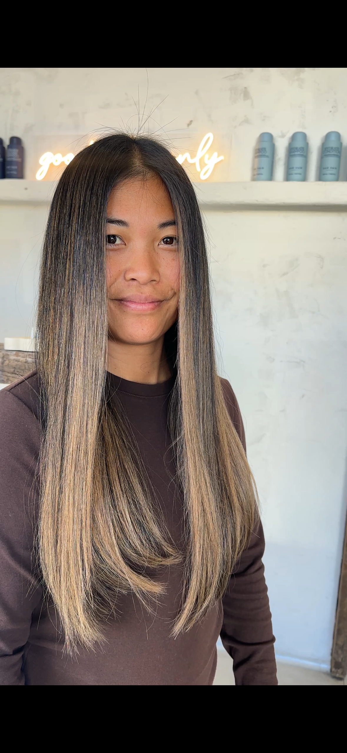 Seamless lived in bronde, blending natural brunette depth with a soft bronze. By Kara's Hair Chair Belmont NSW.
