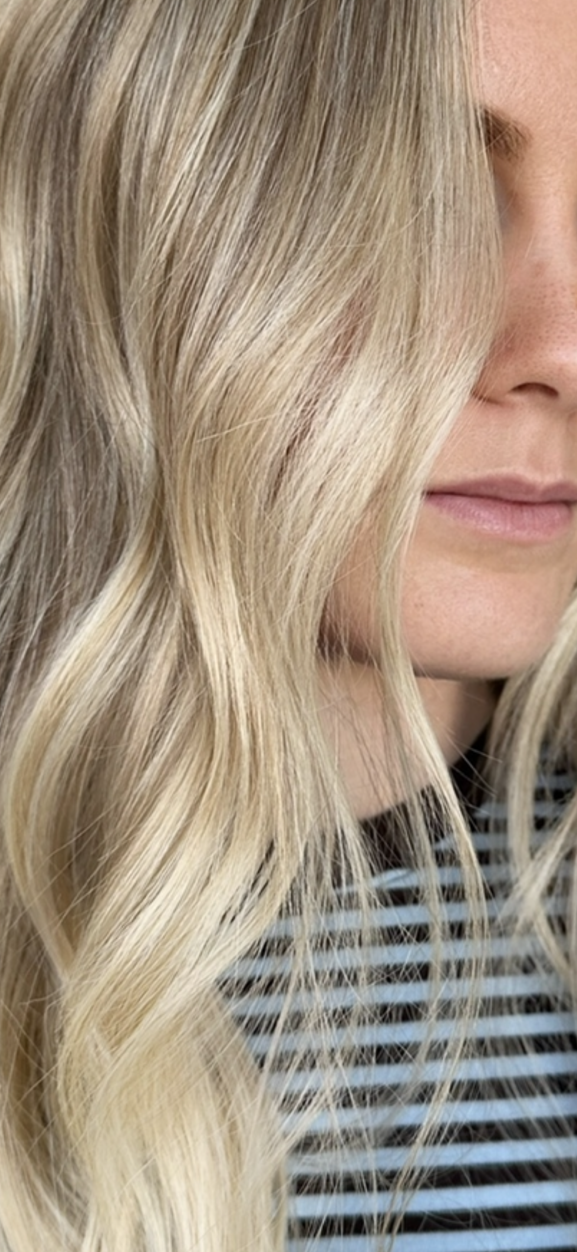 Soft lived in blonde with dimensional tones and a seamless low maintenance finish by Kara's Hair Chair in Belmont NSW.
