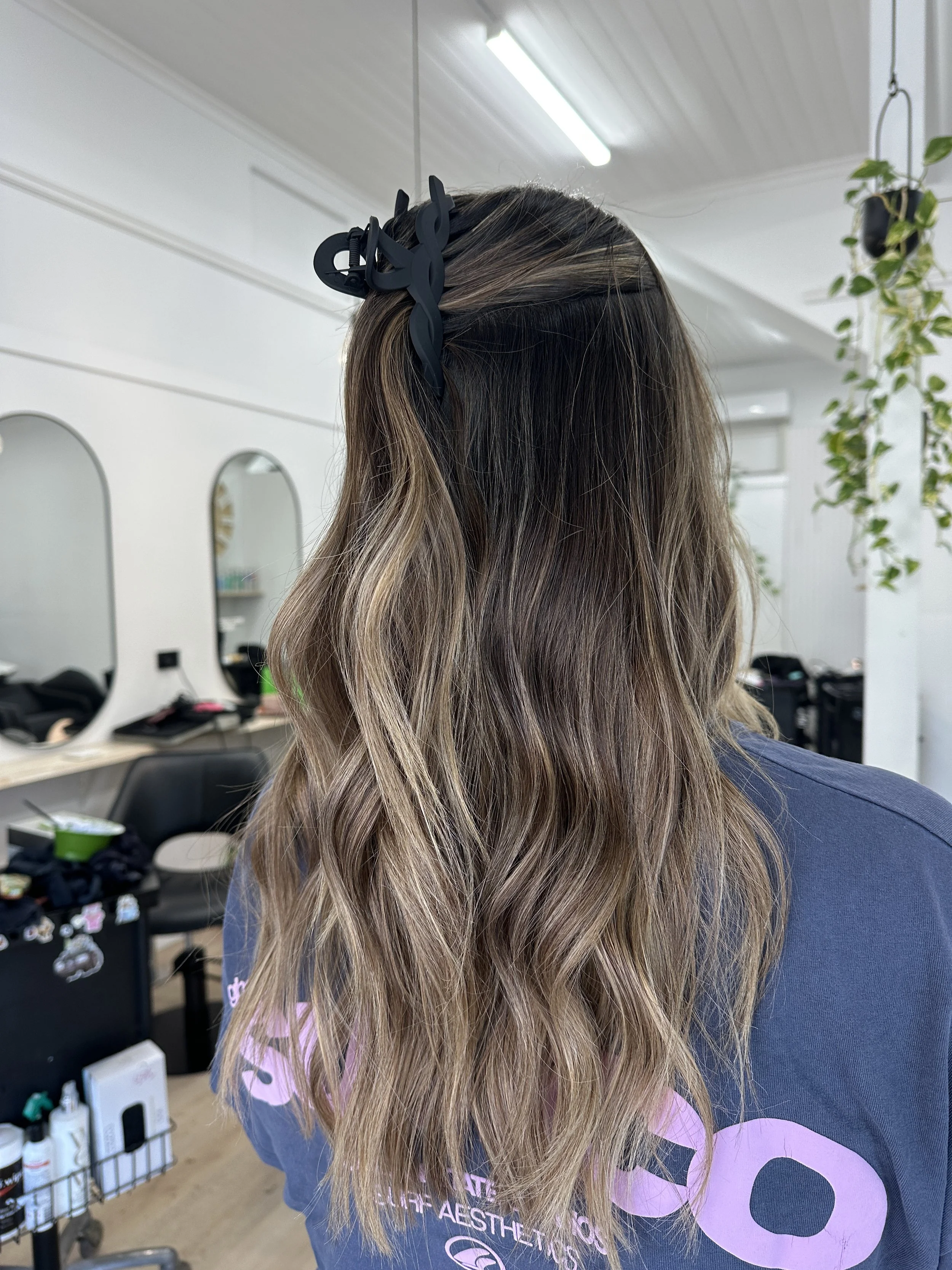 Lived in brunette balayage with natural dark roots blending in to bright blonde ends by Kara's Hair Chair Belmont NSW.