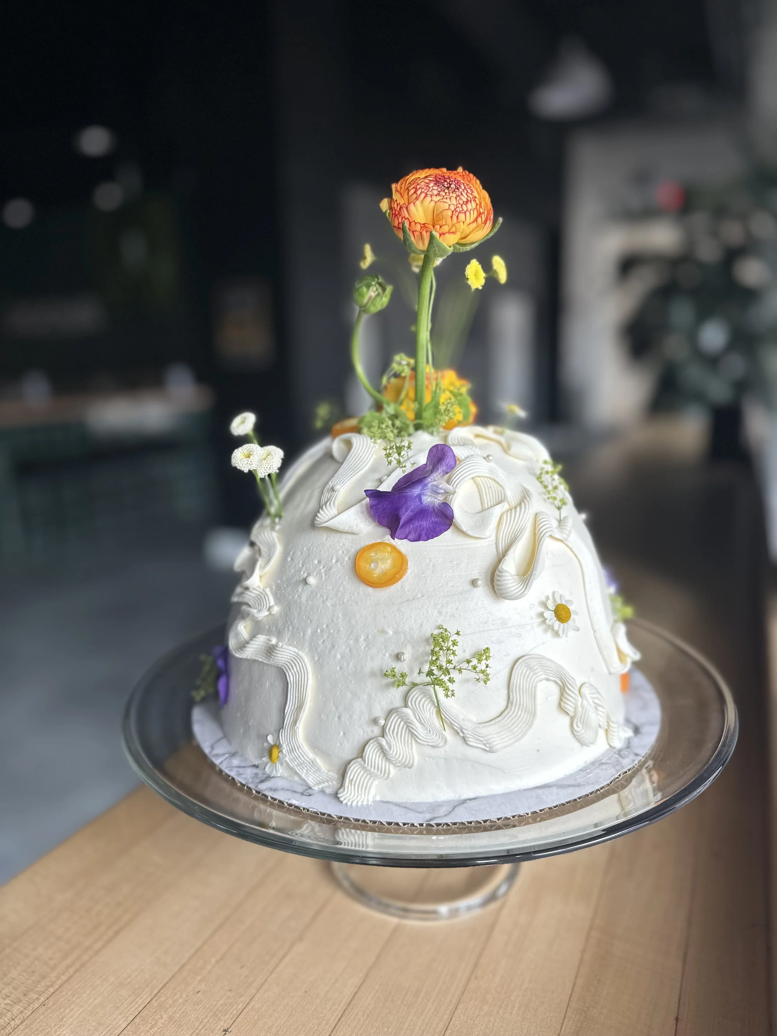 whimsy cake composed of matcha sponge, calamansi curd and vanilla buttercream