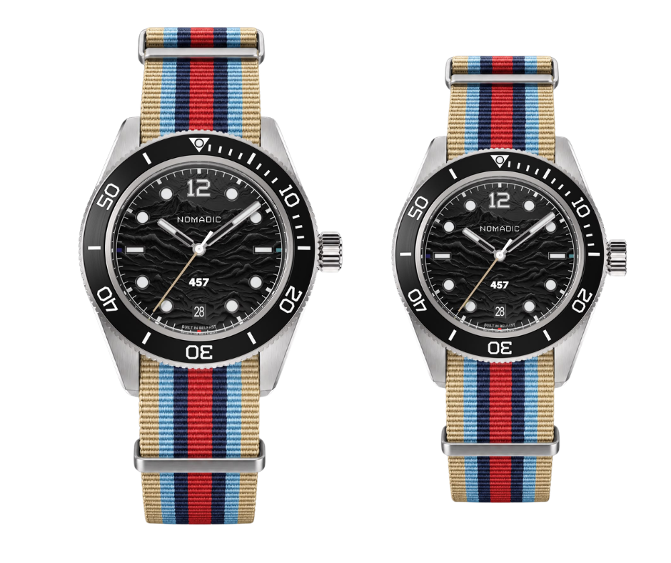 Two wristwatches with black dials, striped fabric straps in beige, red, blue, and white, and a black bezel, side by side.