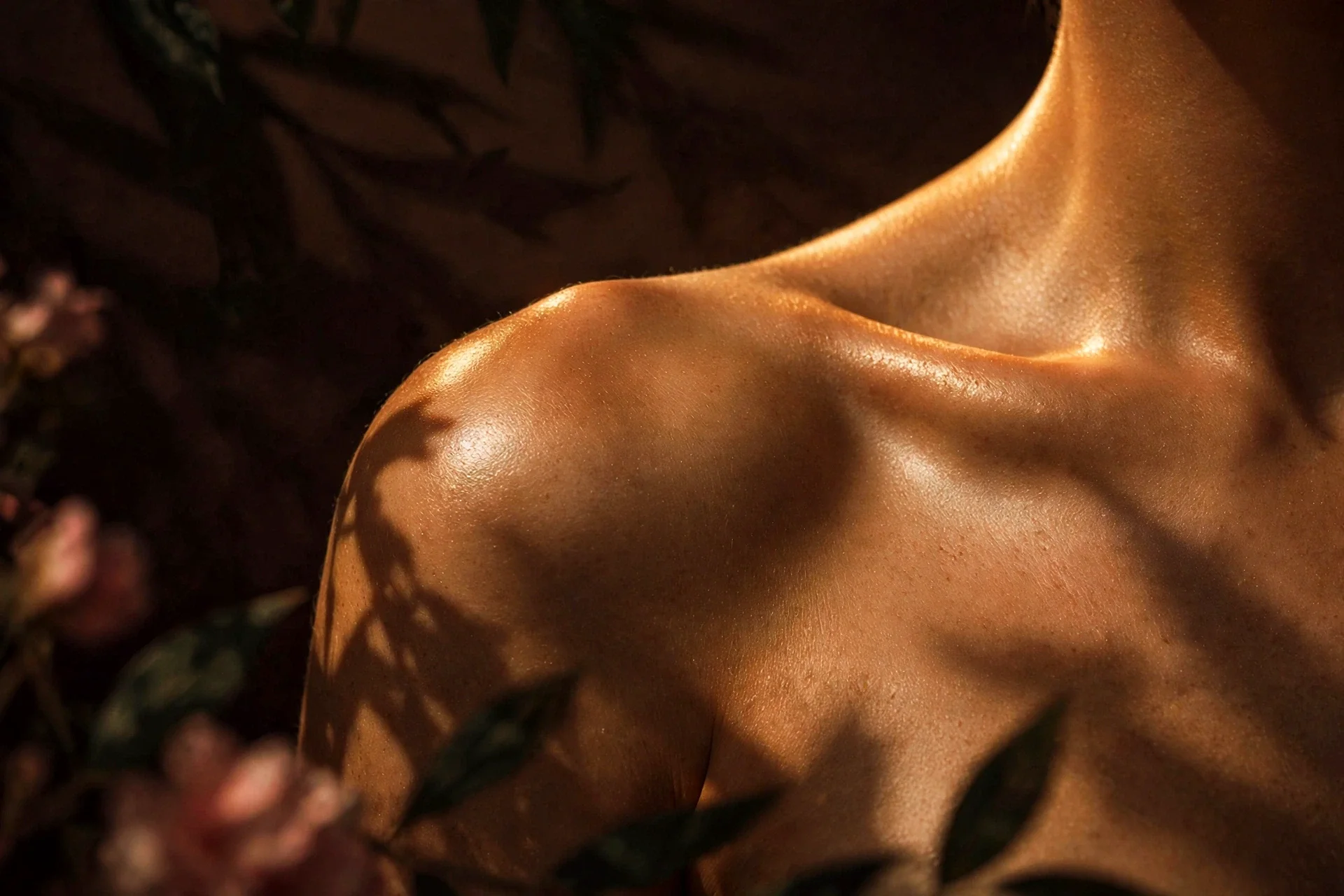 Bronzed shoulder and collarbone — custom airbrush spray tan by Elevate Sunless, Orem Utah