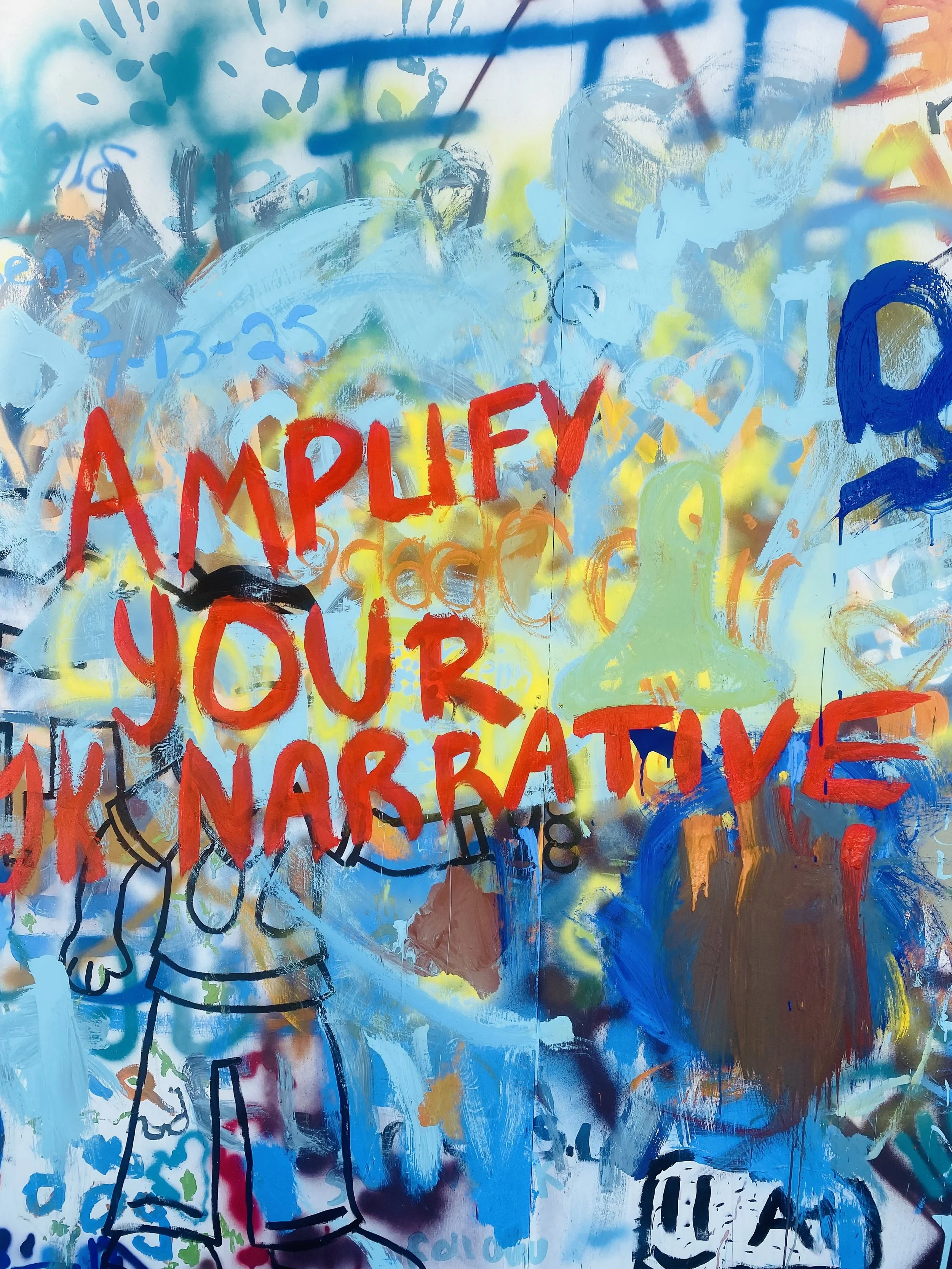 Colorful mixed media artwork featuring the words “Amplify Your Narrative.”