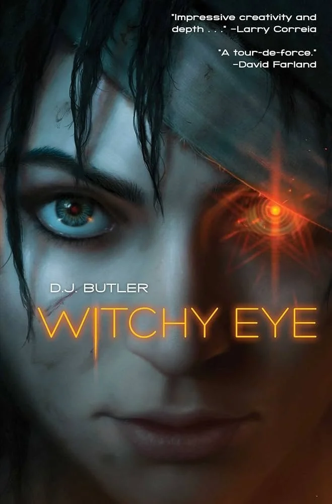 Close-up of a woman's face with glowing, supernatural-looking eye emitting an orange light, dark hair, and intense expression, with the title "WITCHY EYE" in bright orange text and quotes from reviews at the top.