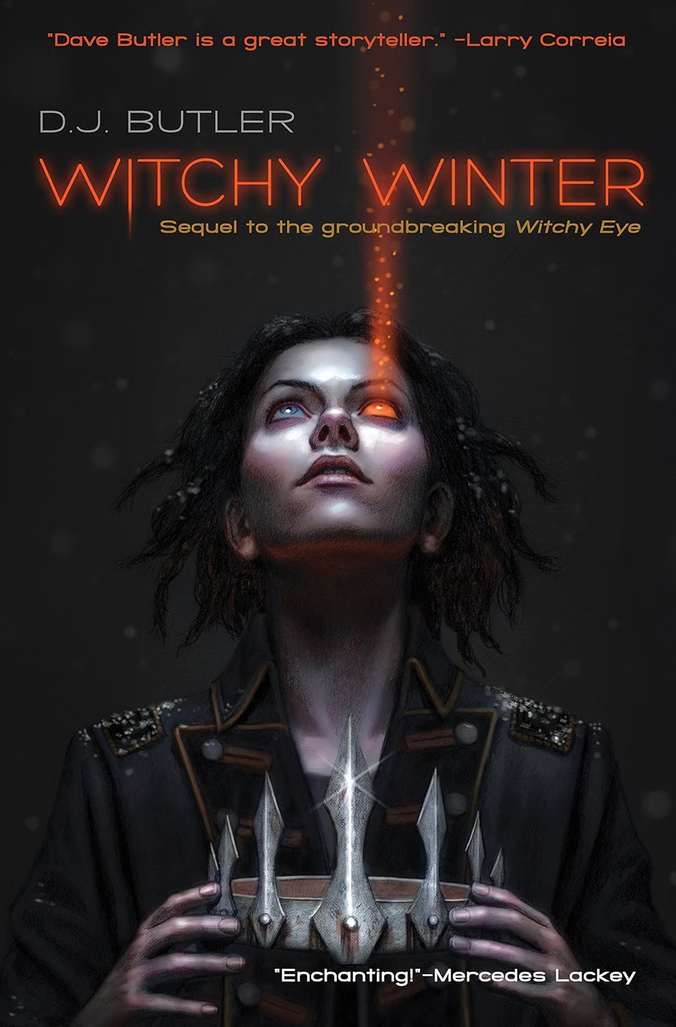 Book cover for 'Witchy Winter' by D.J. Butler featuring a woman with dark, messy hair holding a metallic crown, looking upwards with glowing eyes, and an orange beam of light shooting from her forehead. The background is dark with floating particles, and the title and author's name are prominently displayed.