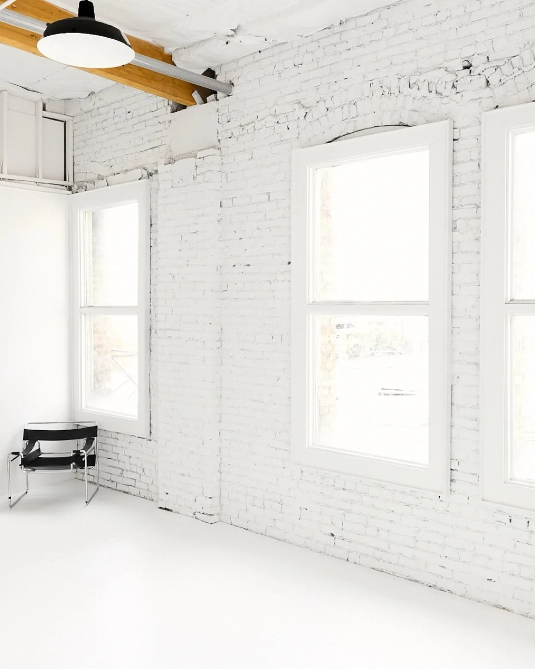 The loft got a little update. Gaps between the walls and floors are now sealed. The holes up top on the brick wall are filled in. And furniture has been refreshed inside the foyer. The same space you know and love, just a little more polished. 

Havi