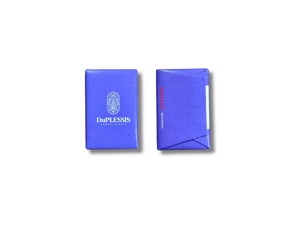 Two blue chocolate bars with "DuPLESSIS" branding wrapped in a full envelope packaging the style on plain white background.