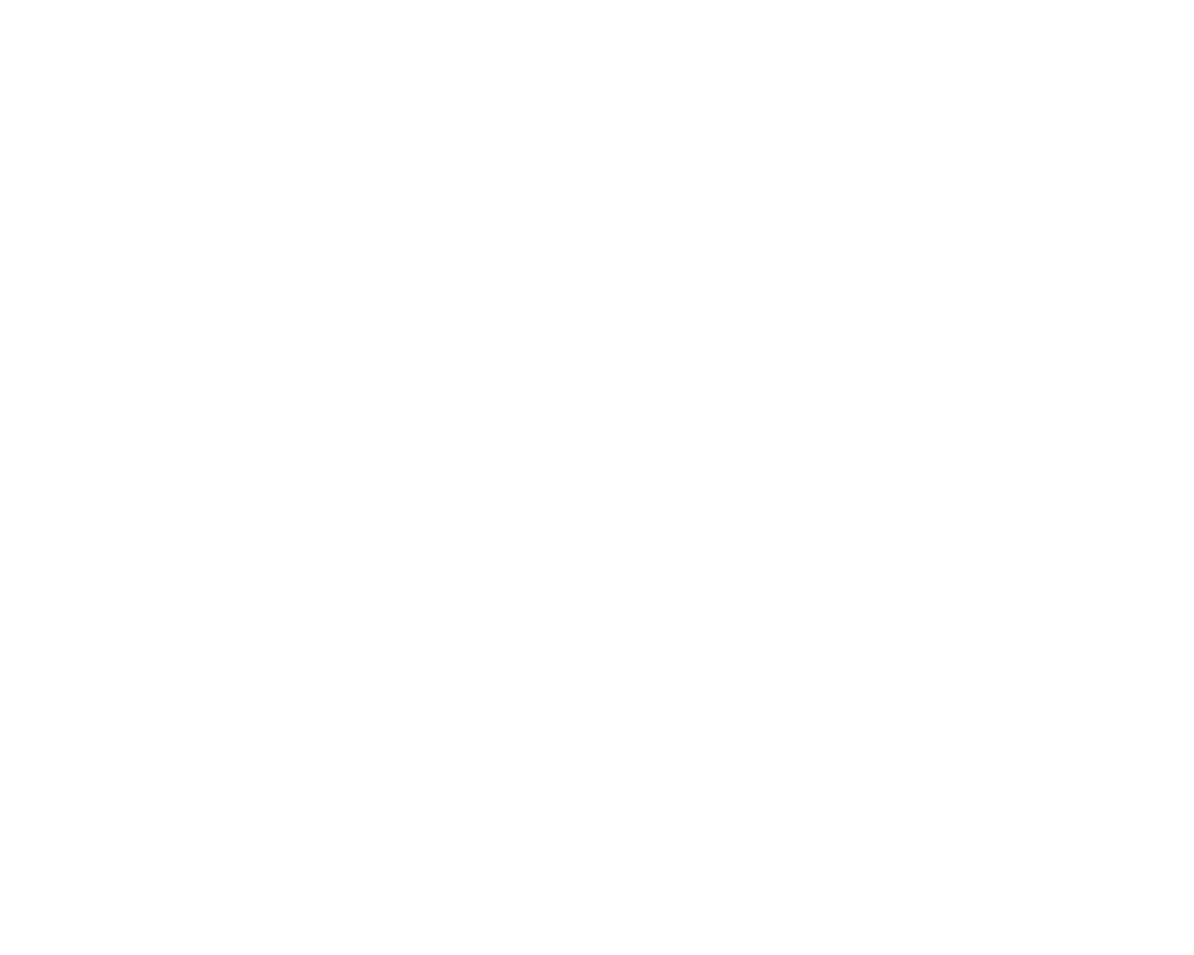Line drawing of a lightbulb with rays emitting from it on a black background representing innovation.