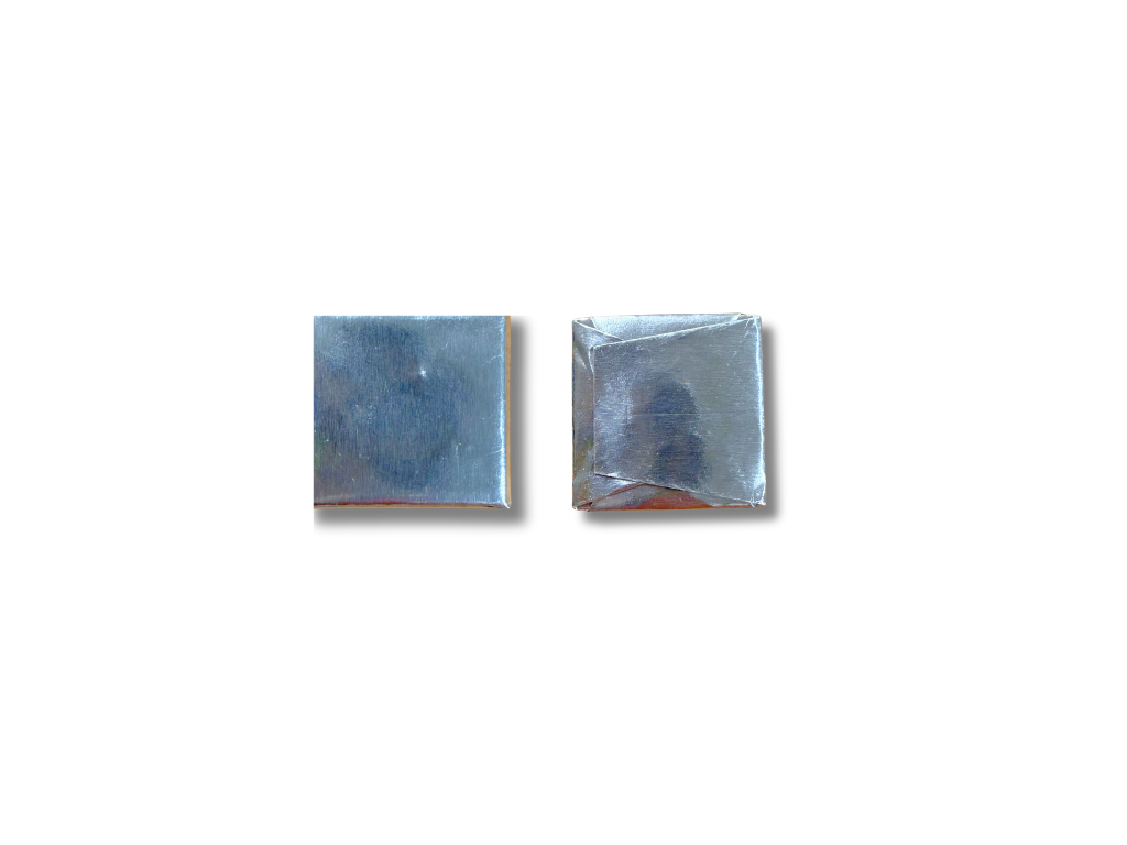 Two Napolitains wrapped in a single layer packaging style in silver foil, placed side by side on a white background.
