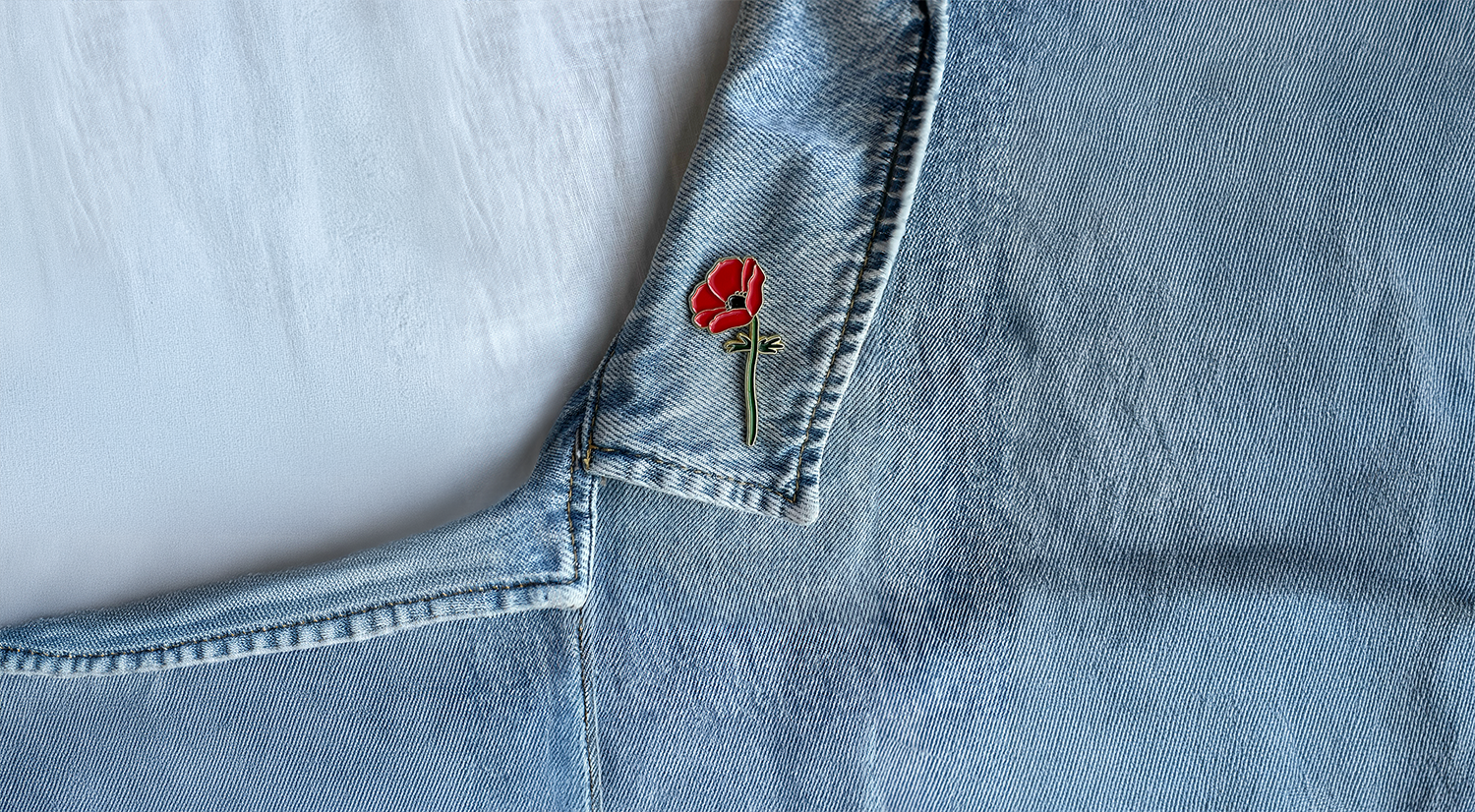 1st fold gif_small_pin on jeans jacket.png