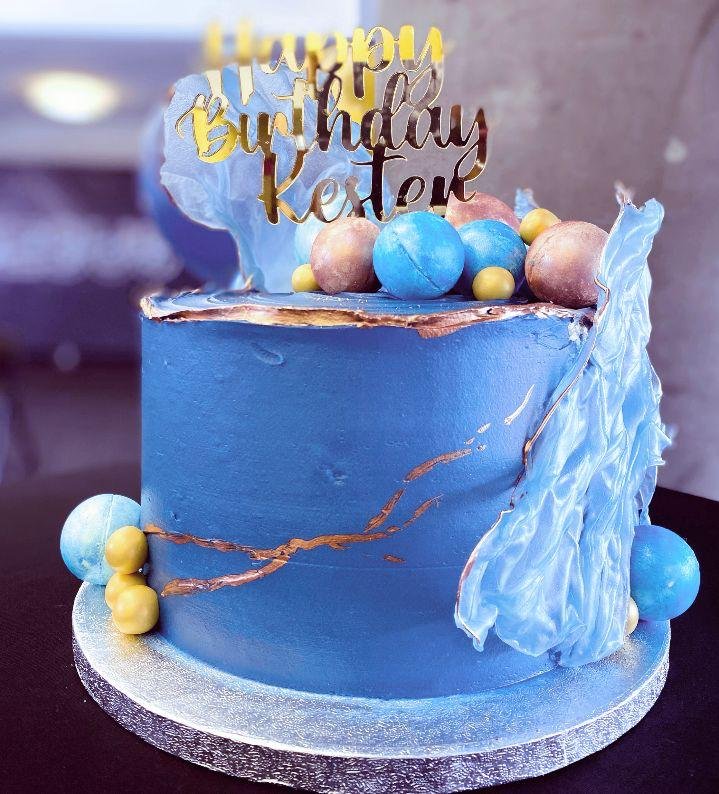 Blue marble cake with chocolate sails
