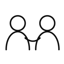 To personer i dialog – symbol på samarbejde, relationer og fælles udvikling.