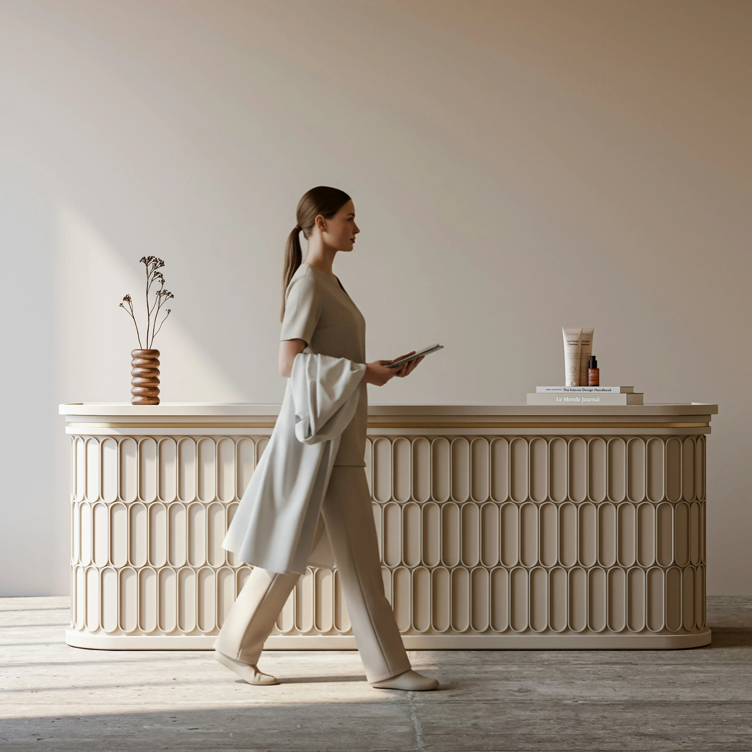 clinic reception with female practitioner walking past