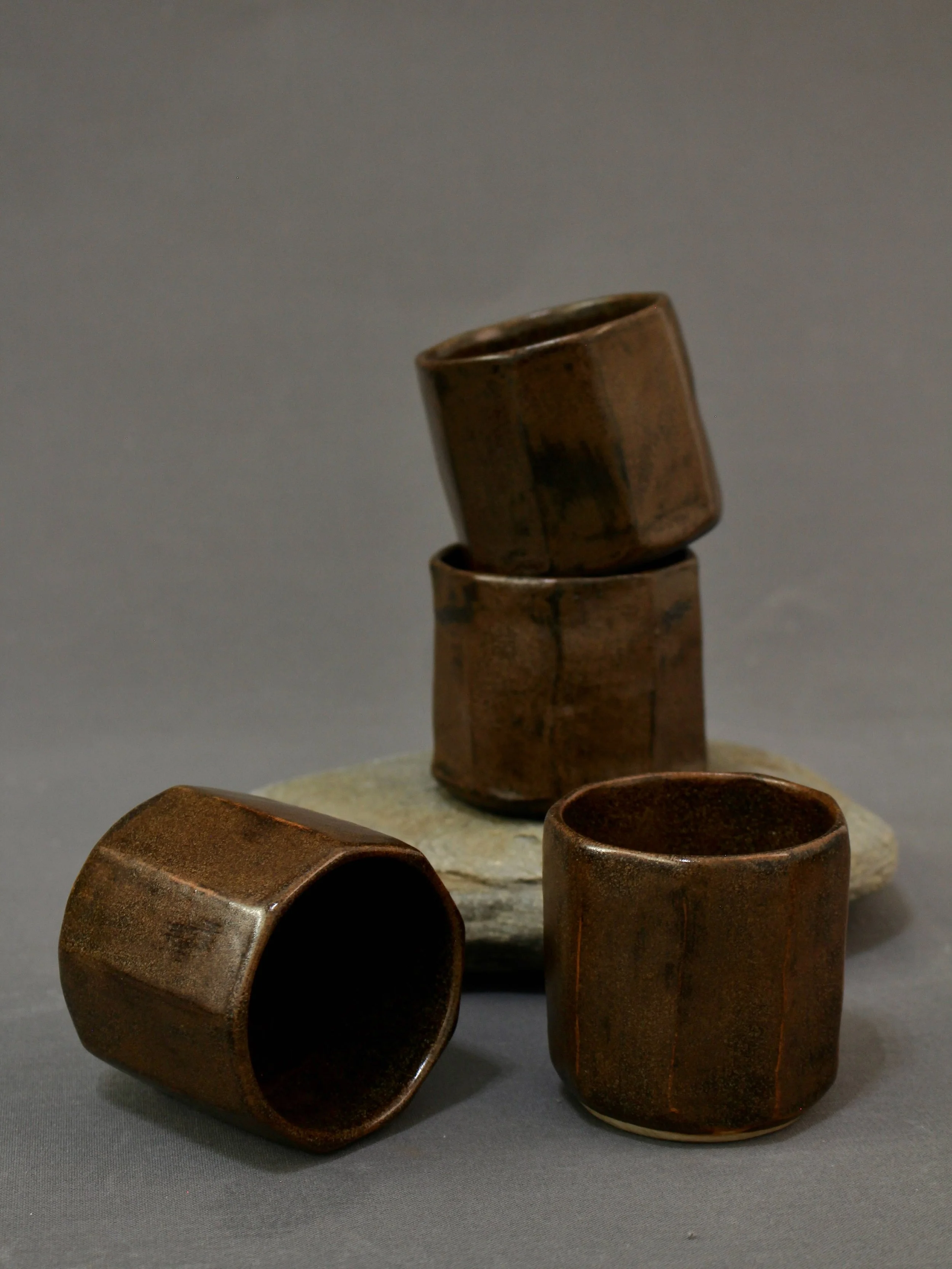 Brown ceramic faceted cups - each thrown on the wheel and carved by hand. 

#pottery #ceramics #handmade #craft #follydesignstudio
