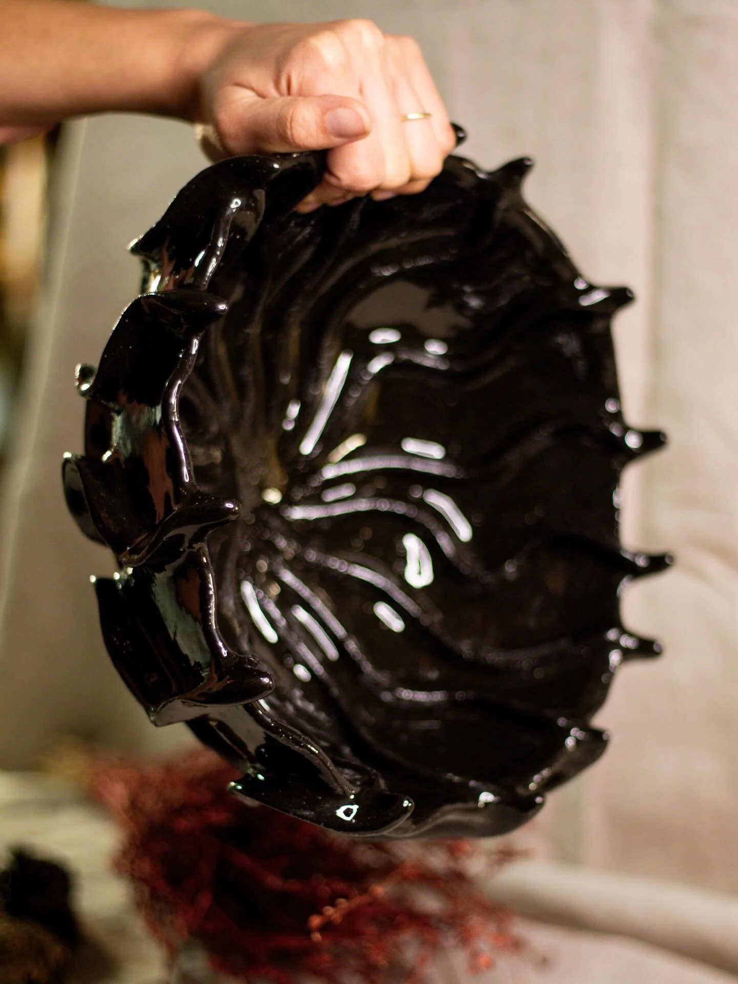 A large sculptural bowl with individual wandering ripples - each curve inviting touch across its glossy surface. A piece made to hold fruit, but to also stand out within the heart of the home. 

📸: @the.madbitch 

#pottery #ceramics #handmade #black