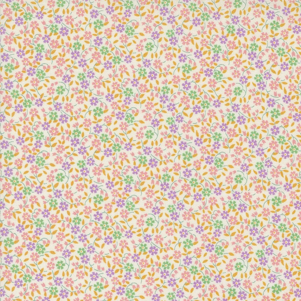 A fabric with a small floral pattern in pastel colors of purple, pink, green, and orange on a white background.