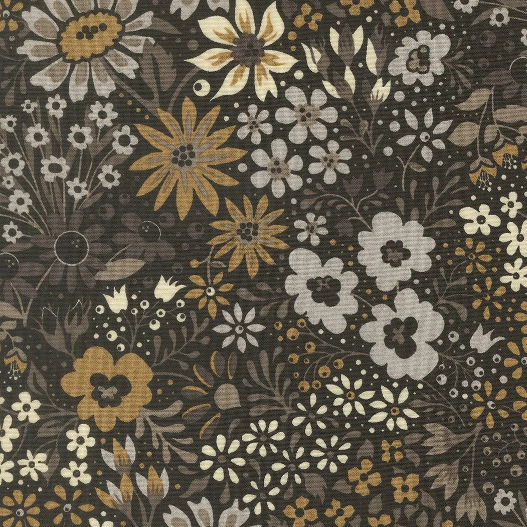 A floral patterned fabric with beige, white, and brown flowers and leaves on a dark background.