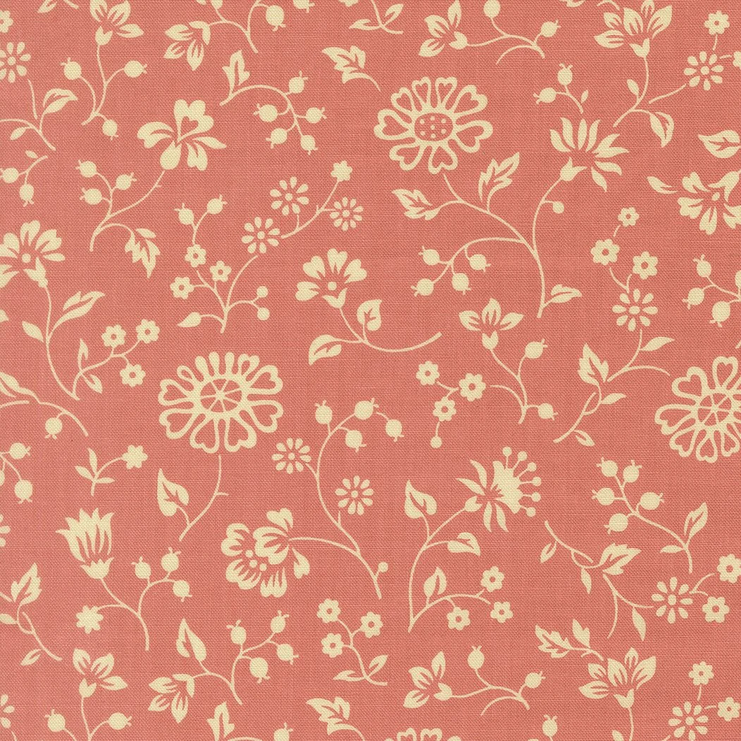 Pink fabric with a white floral pattern featuring various flowers, leaves, and vines.