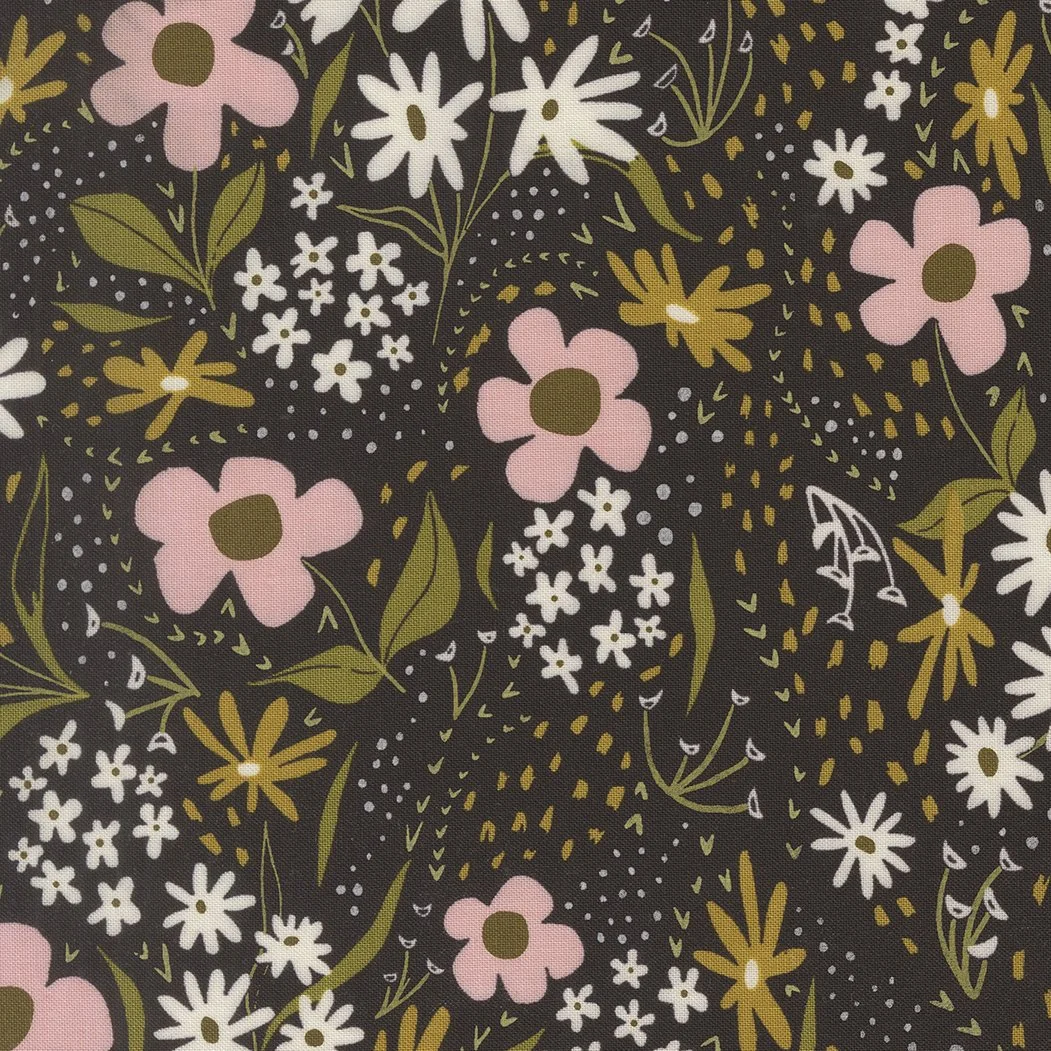 A floral pattern fabric with pink, white, and yellow flowers, and green leaves on a dark background.