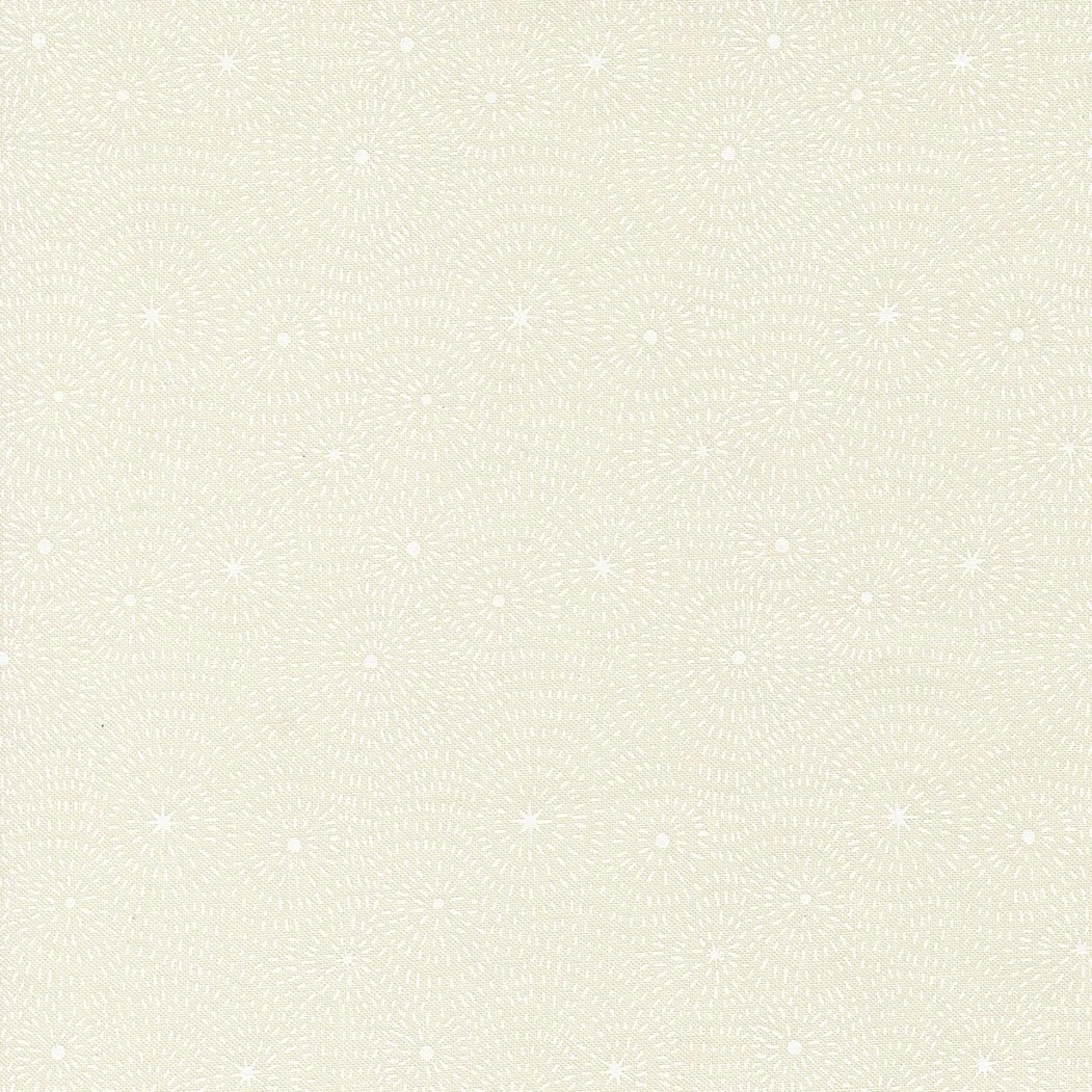 No visible objects in the image, just a pattern of cream-colored textured background with subtle starburst and dot designs.
