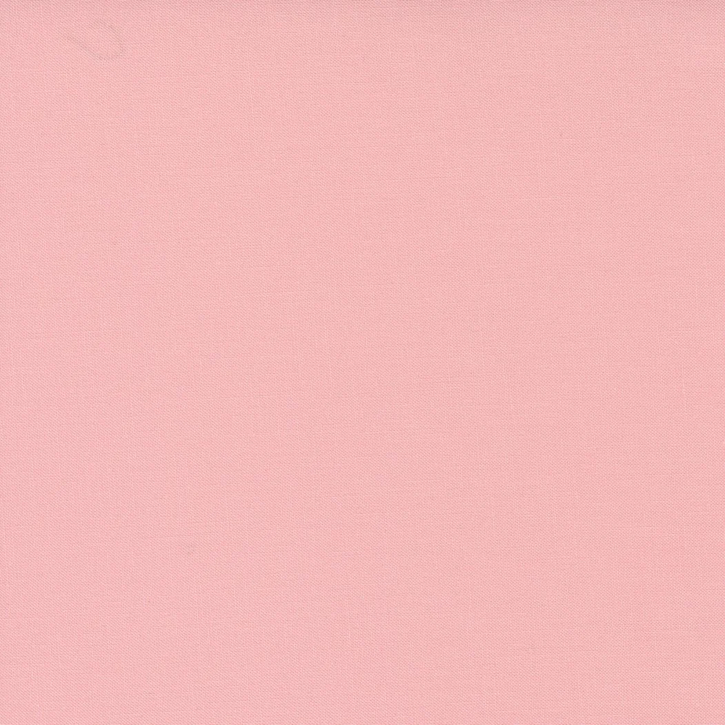 A plain pink textured background.