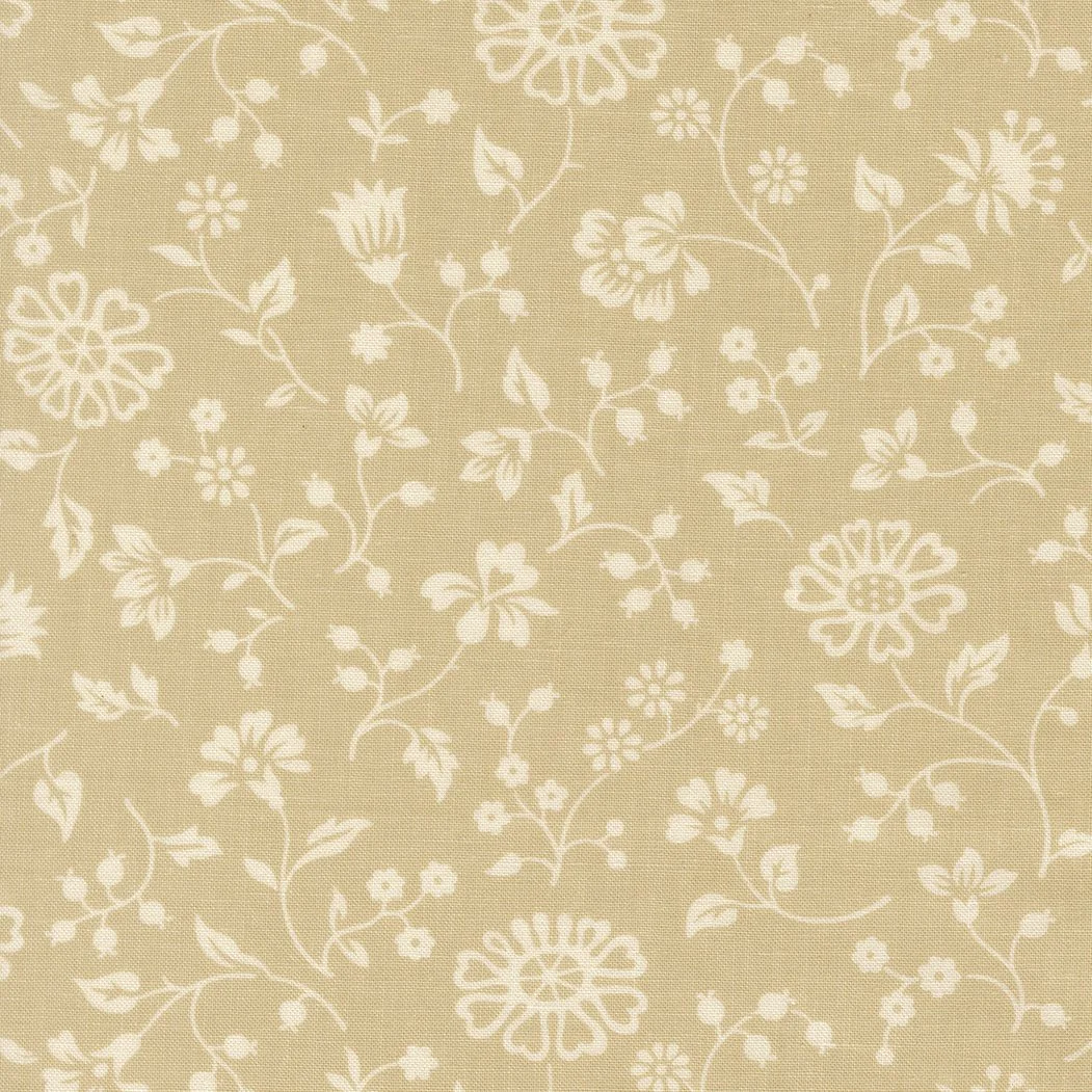Beige fabric with white floral pattern featuring flowers, leaves, and vines.