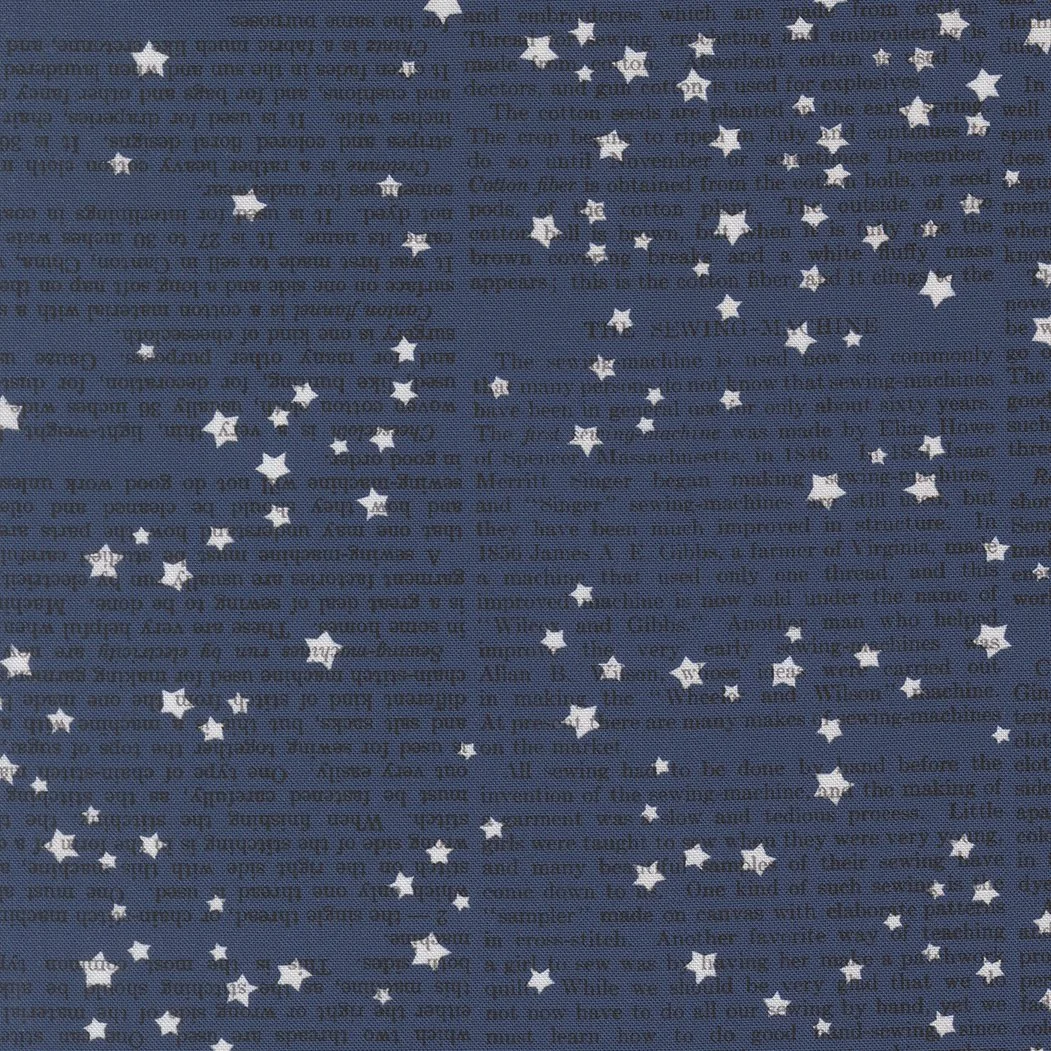 A blue fabric background with white star patterns and faint, dark text printed across it.