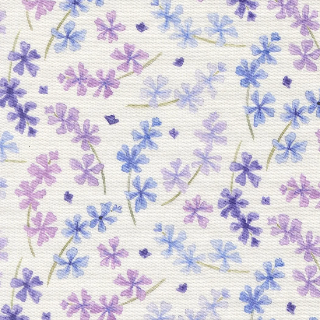 Pattern of pink, purple, and blue small flowers with green stems on a white background.