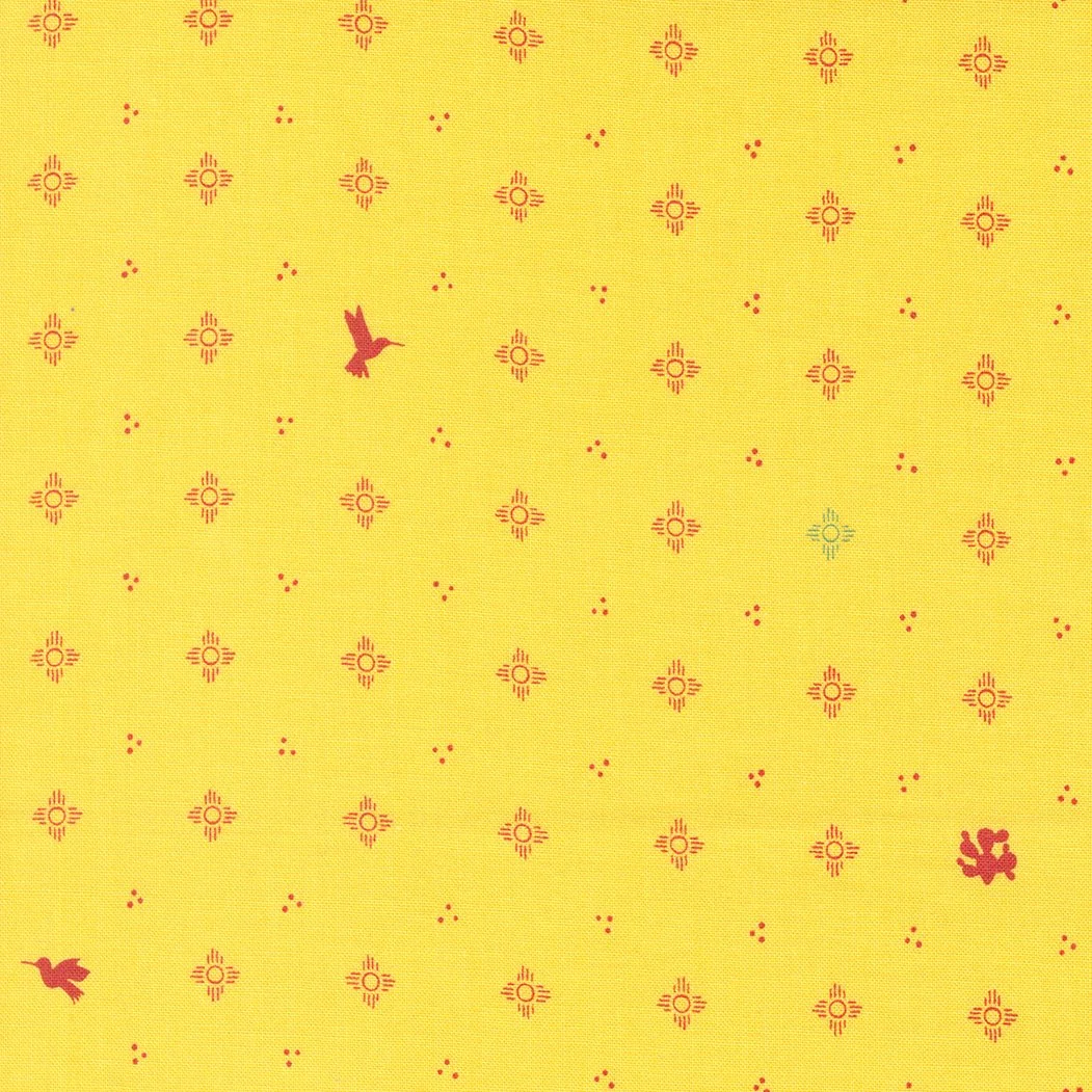 Yellow fabric with red floral patterns, a flying red bird, and a small red flower.