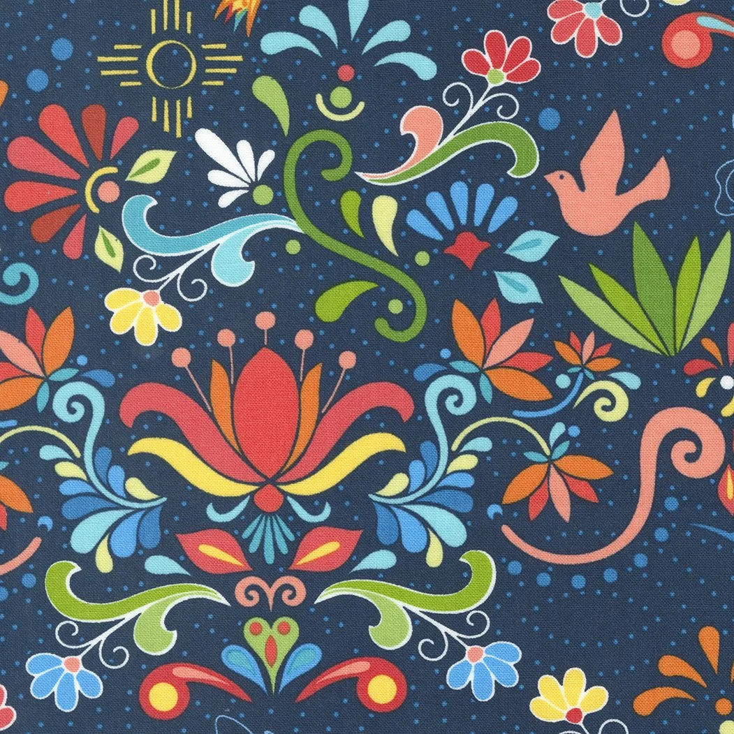 Colorful floral and abstract pattern on fabric with flowers, leaves, a bird, and a stylized sun on a dark background.