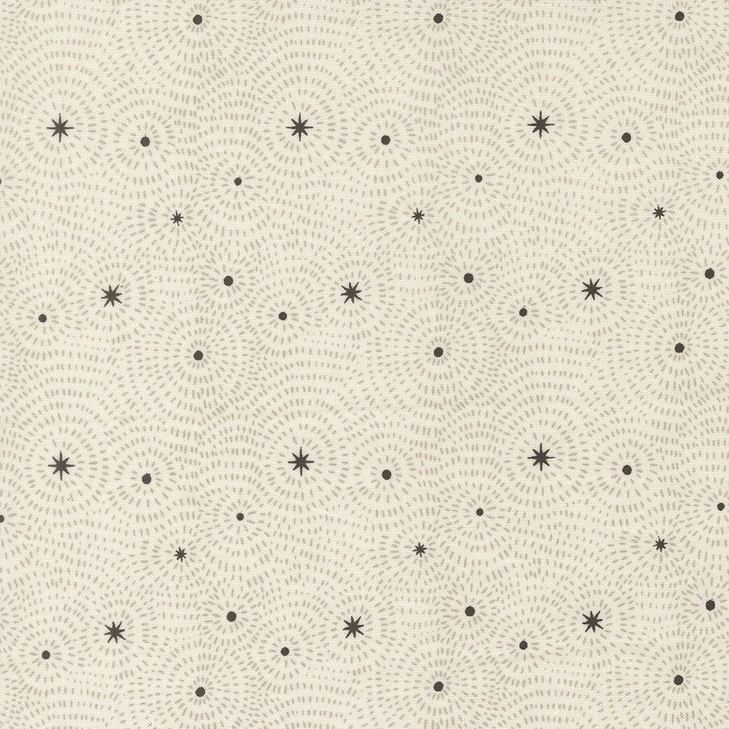Pattern of small, circular lines and star-like shapes on a beige background.
