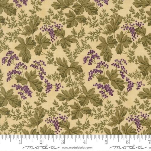 Close-up of fabric with a botanical pattern of purple berries and green leaves on a beige background, with a ruler at the bottom showing inches.