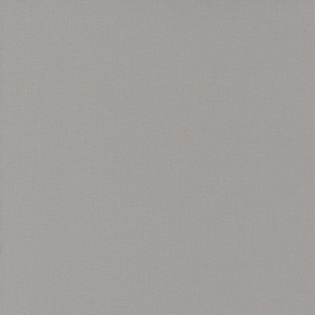 The image shows a plain, textured grey fabric surface.