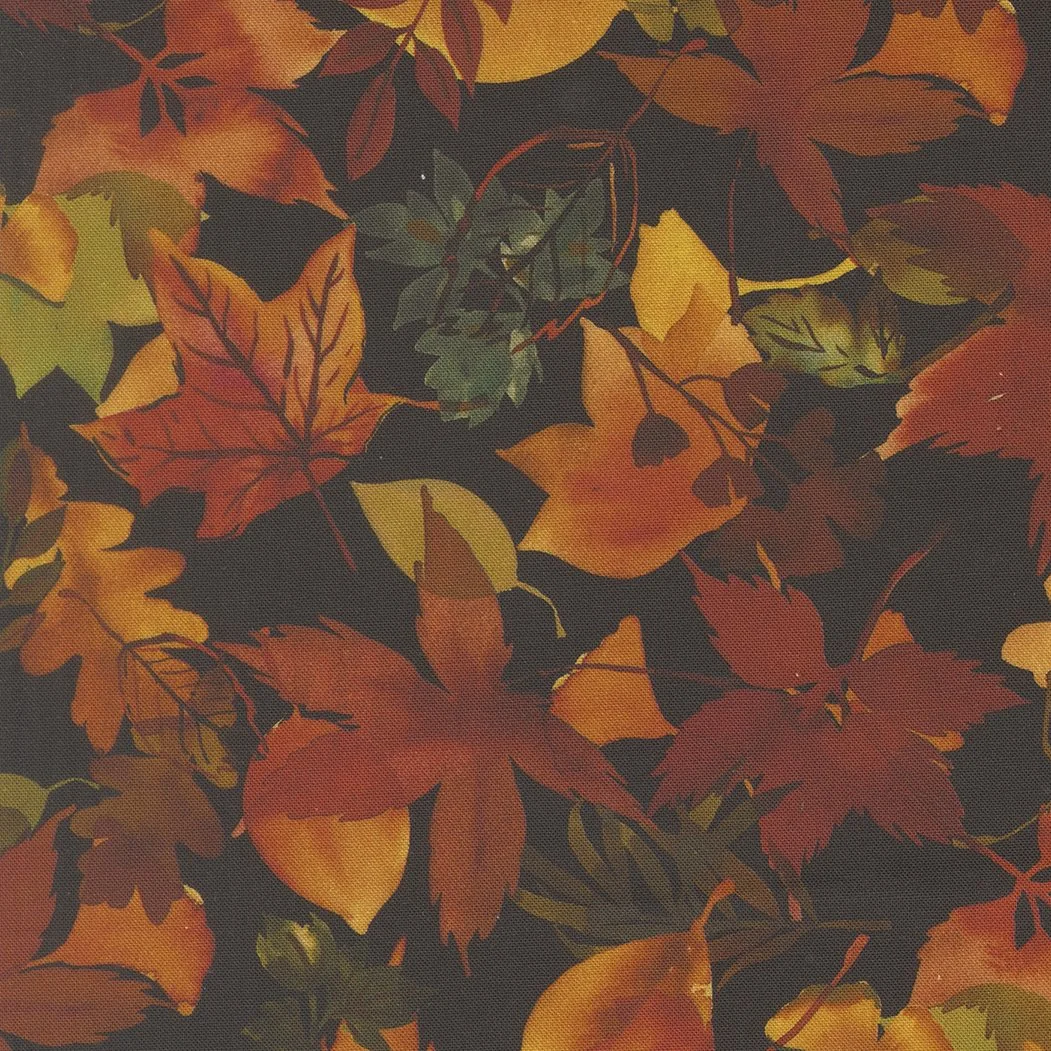 Pattern of colorful autumn leaves in red, orange, yellow, and green on a dark background.