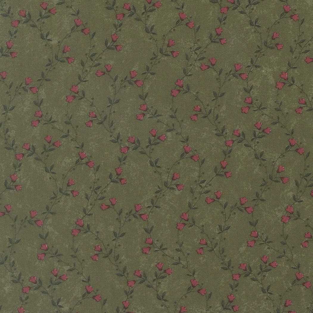 Olive green fabric with a small pink and green floral pattern.