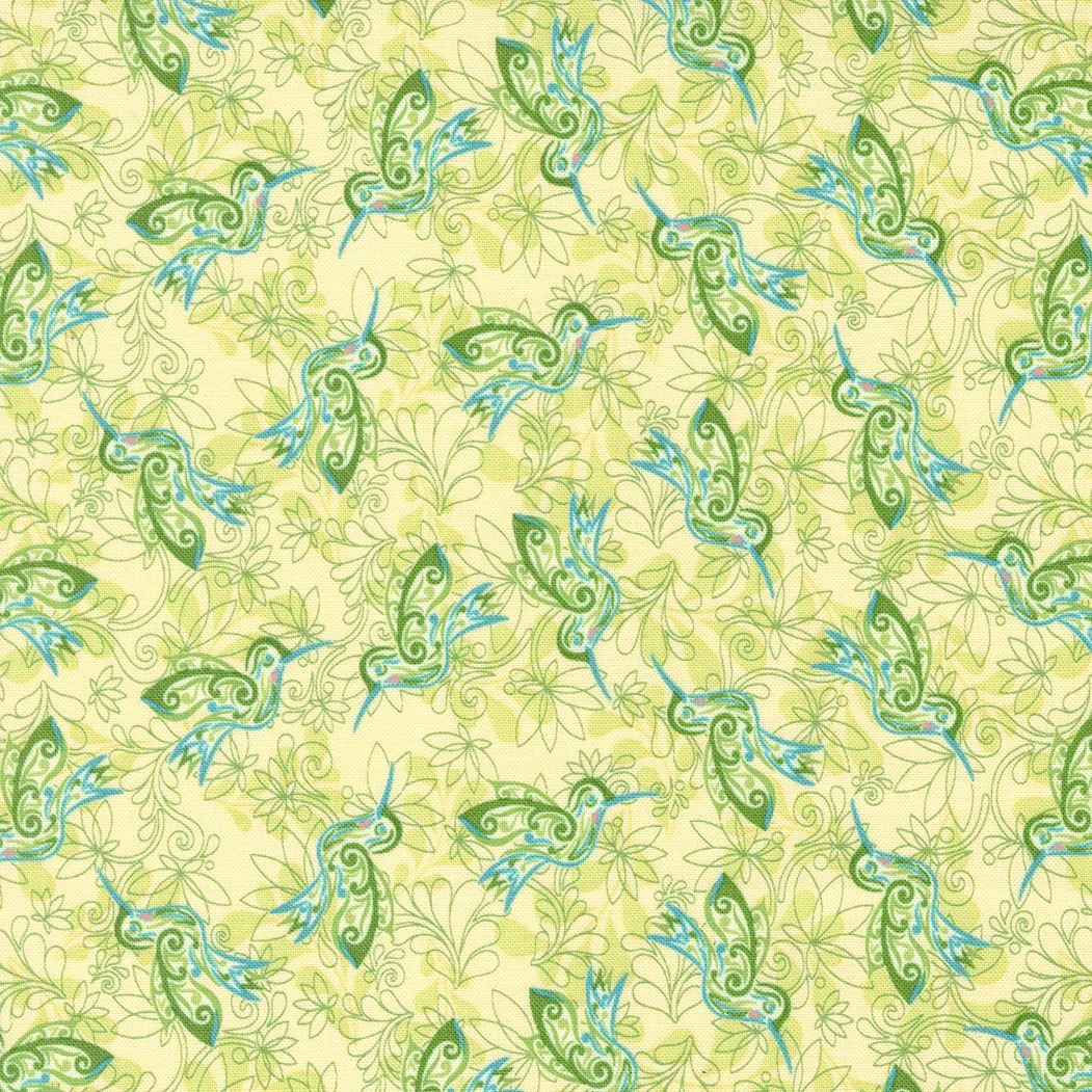 A patterned fabric featuring stylized hummingbirds in green and blue hues with background of light green leafy outlines.