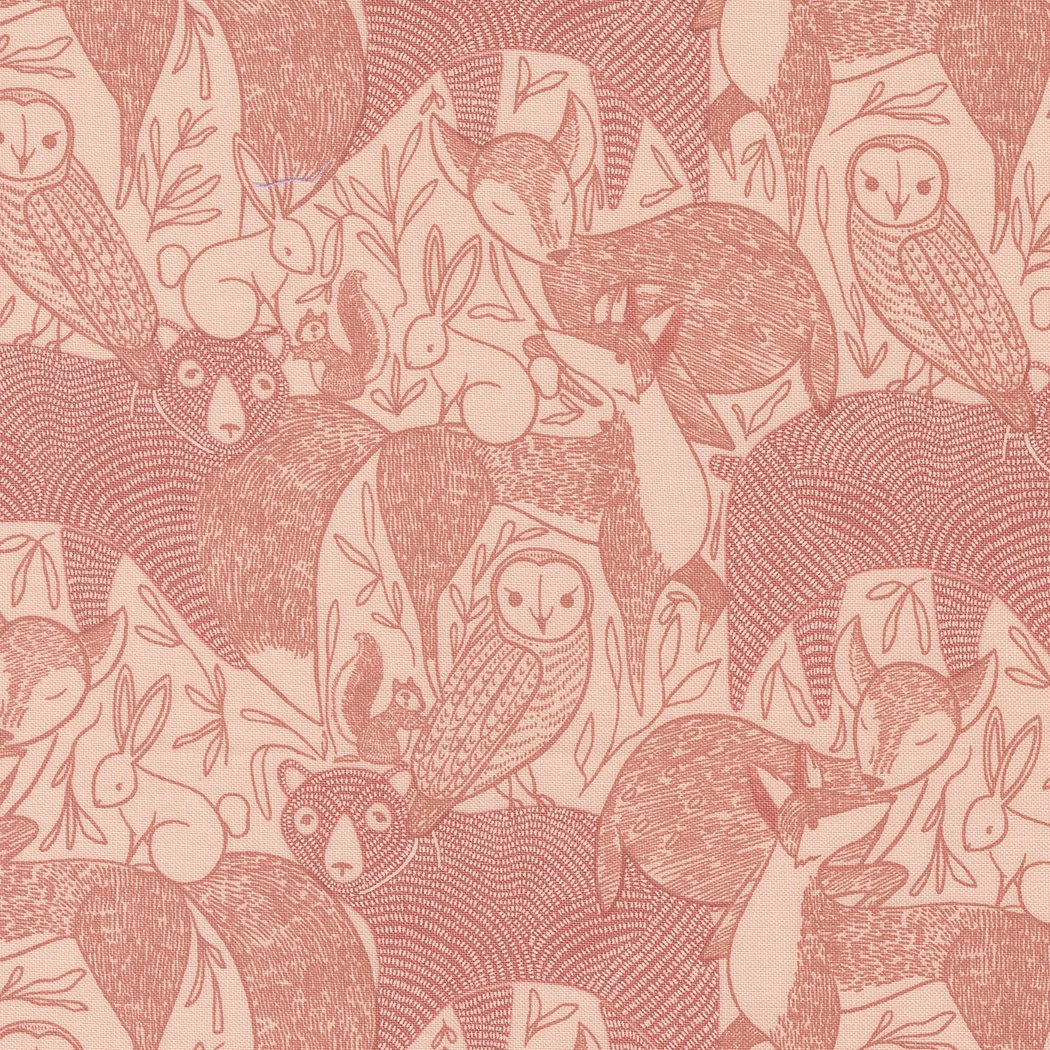 A patterned fabric with illustrations of foxes, owls, rabbits, and squirrel surrounded by leaves and berries in shades of pink and coral.