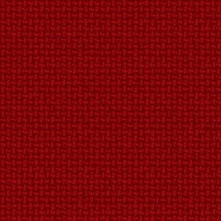 Close-up of a red textured fabric surface.