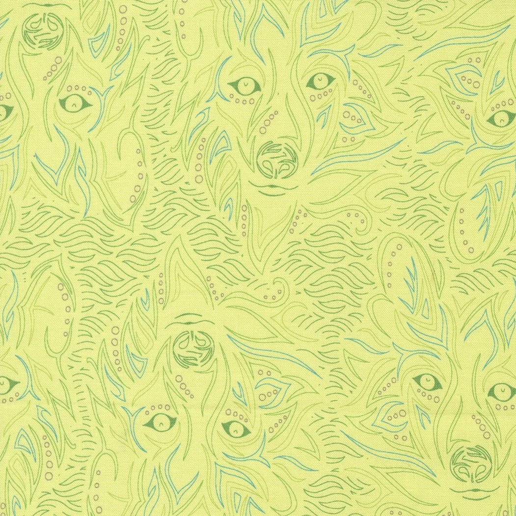 A patterned fabric with abstract feline faces and eye motifs in green, blue, and beige tones.