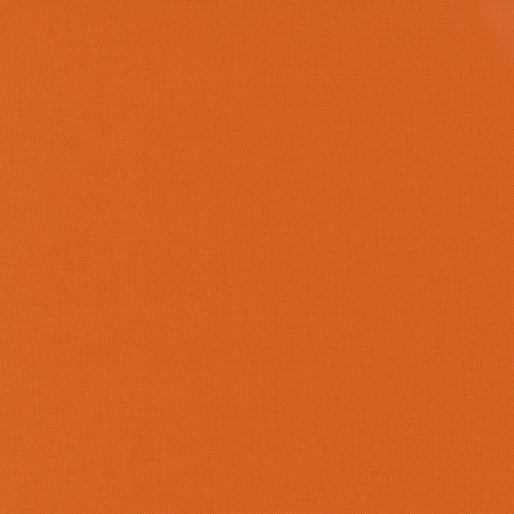 Close-up of orange fabric with a fine weave pattern.
