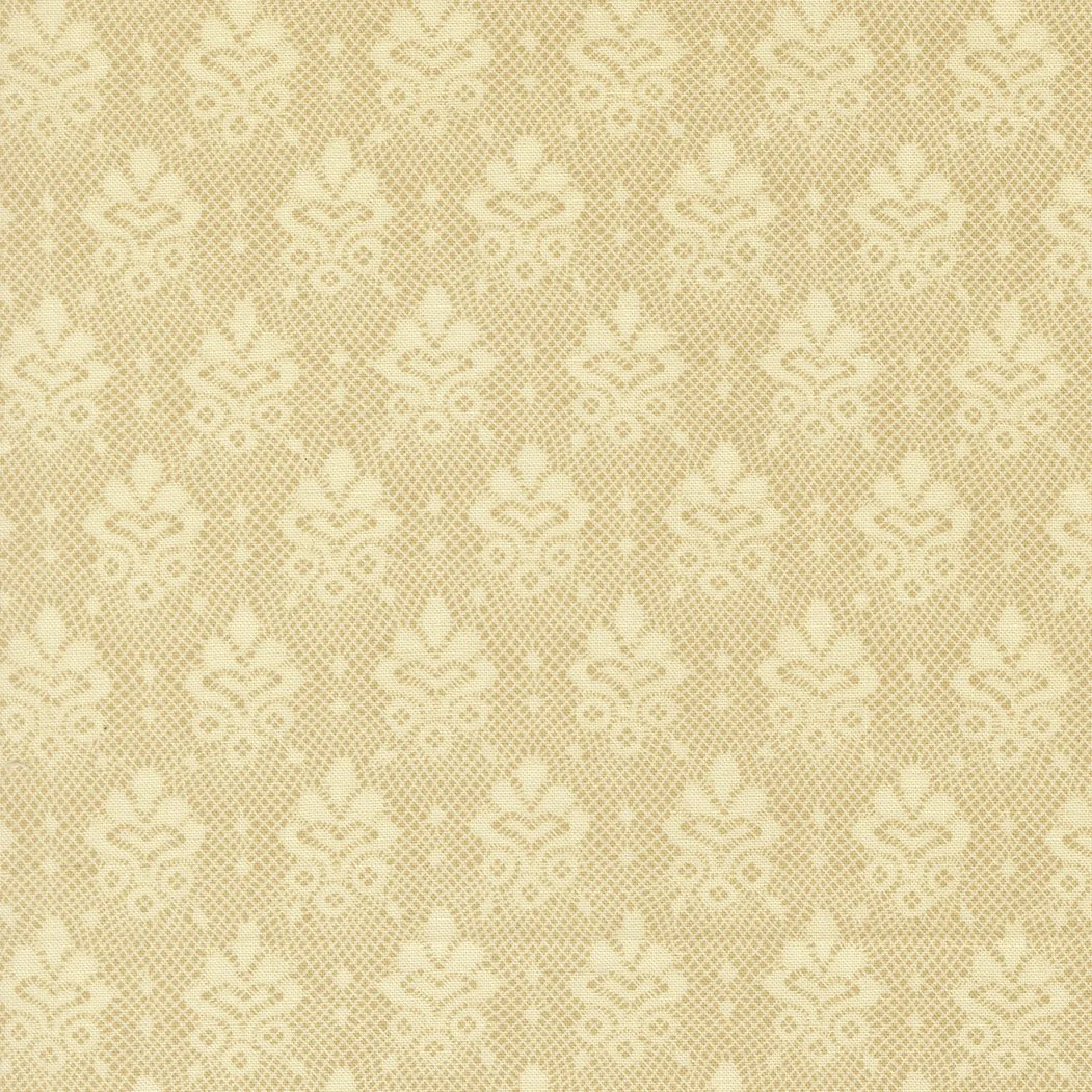 Cream-colored wallpaper with a floral damask pattern.