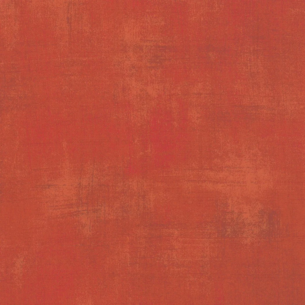 Solid orange textured background.