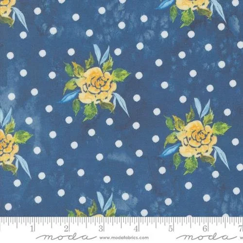 Fabric with yellow roses and green leaves on a blue background with white polka dots.