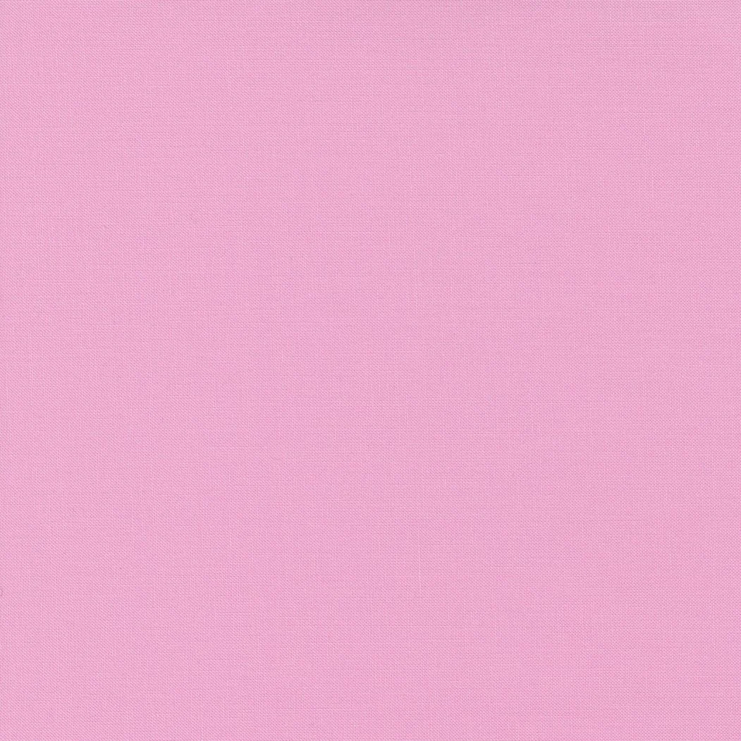 A plain pink textured background.