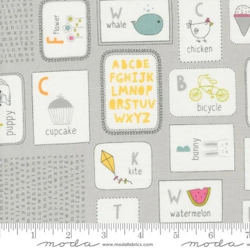 Educational fabric print featuring alphabet letters and corresponding illustrations: flower, whale, chicken, cupcake, bicycle, kite, bunny, and watermelon.