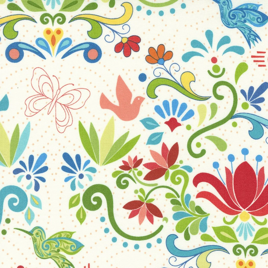 Colorful floral and bird pattern with red, blue, green, and orange accents, including stylized flowers, butterflies, and hummingbirds on a cream background.