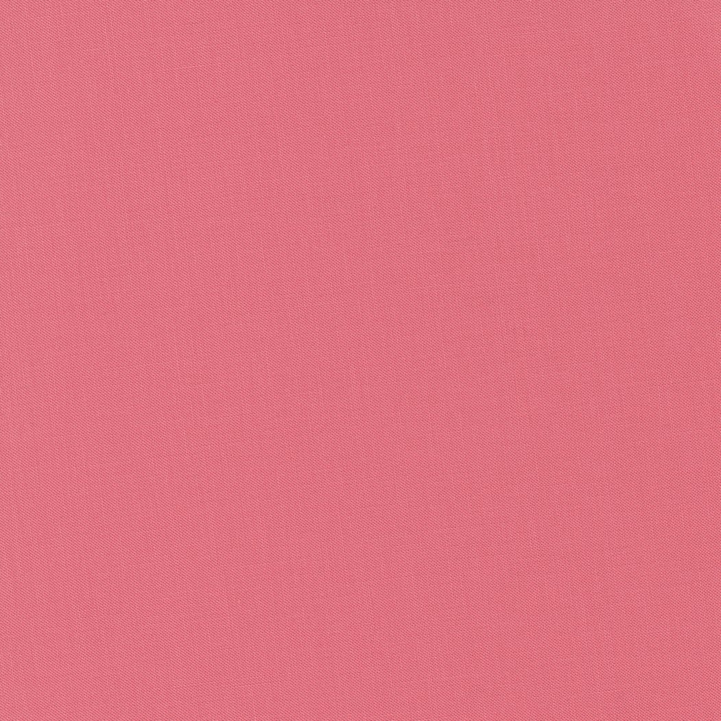 A pink textured background with small dots.